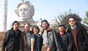 Close-up of the sculptures on Orange Island in Changsha compared with tourists