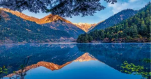 Sunrise at Jiuzhaigou Valley’s Mirror Lake